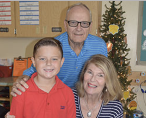  Grandparents visiting their grandson in class. 