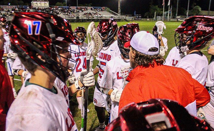 Coach Webb brings the boys in for a quick huddle game plan during their timeout break. Photo Credit: TKA Instagram Photo 